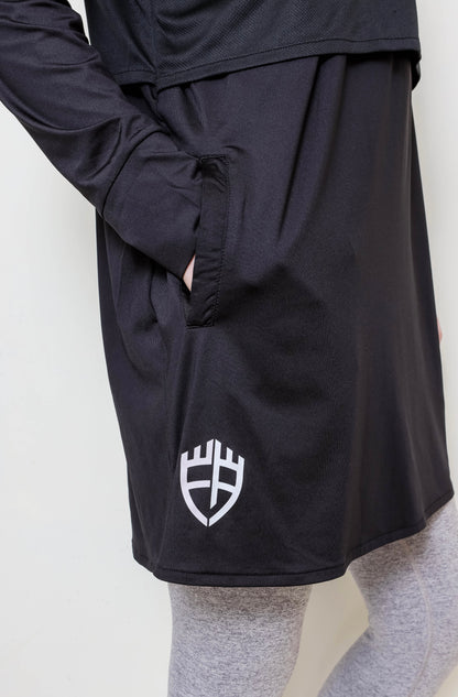 Black athletic outfit with a white logo on a plain background